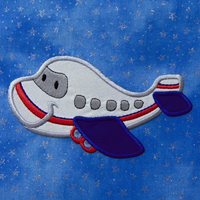 Machine appliqued red, white and blue airplane with eyes for boys and girls alike.  Cute embroidery design for children of all ages.
