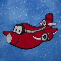 Machine appliqued Airplane Adventures red airplane with smiling  face and eyes.  Perfect for boys and girls.
